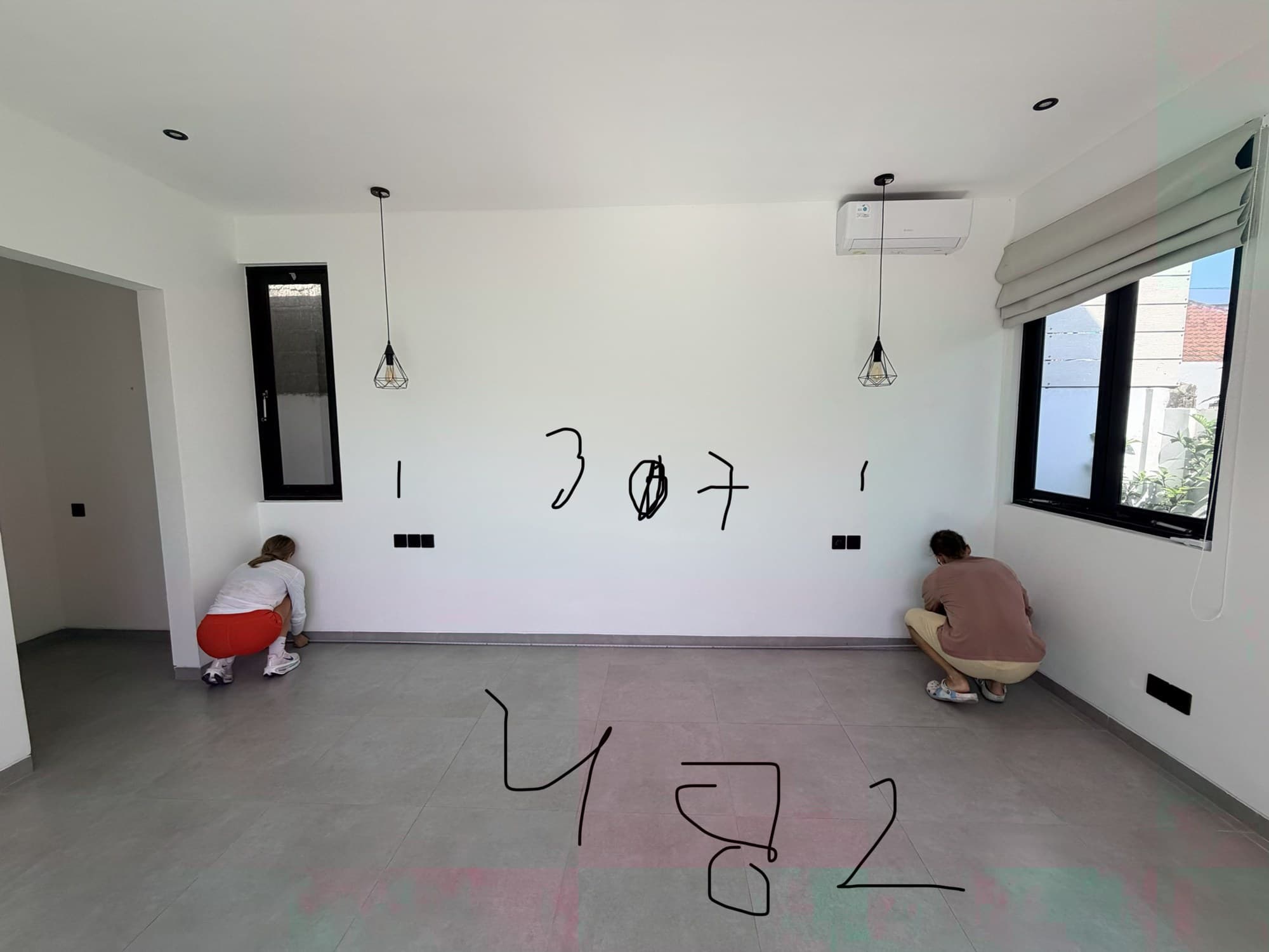 Bedroom before furnishing with two windows, pendant lights and bed measurements