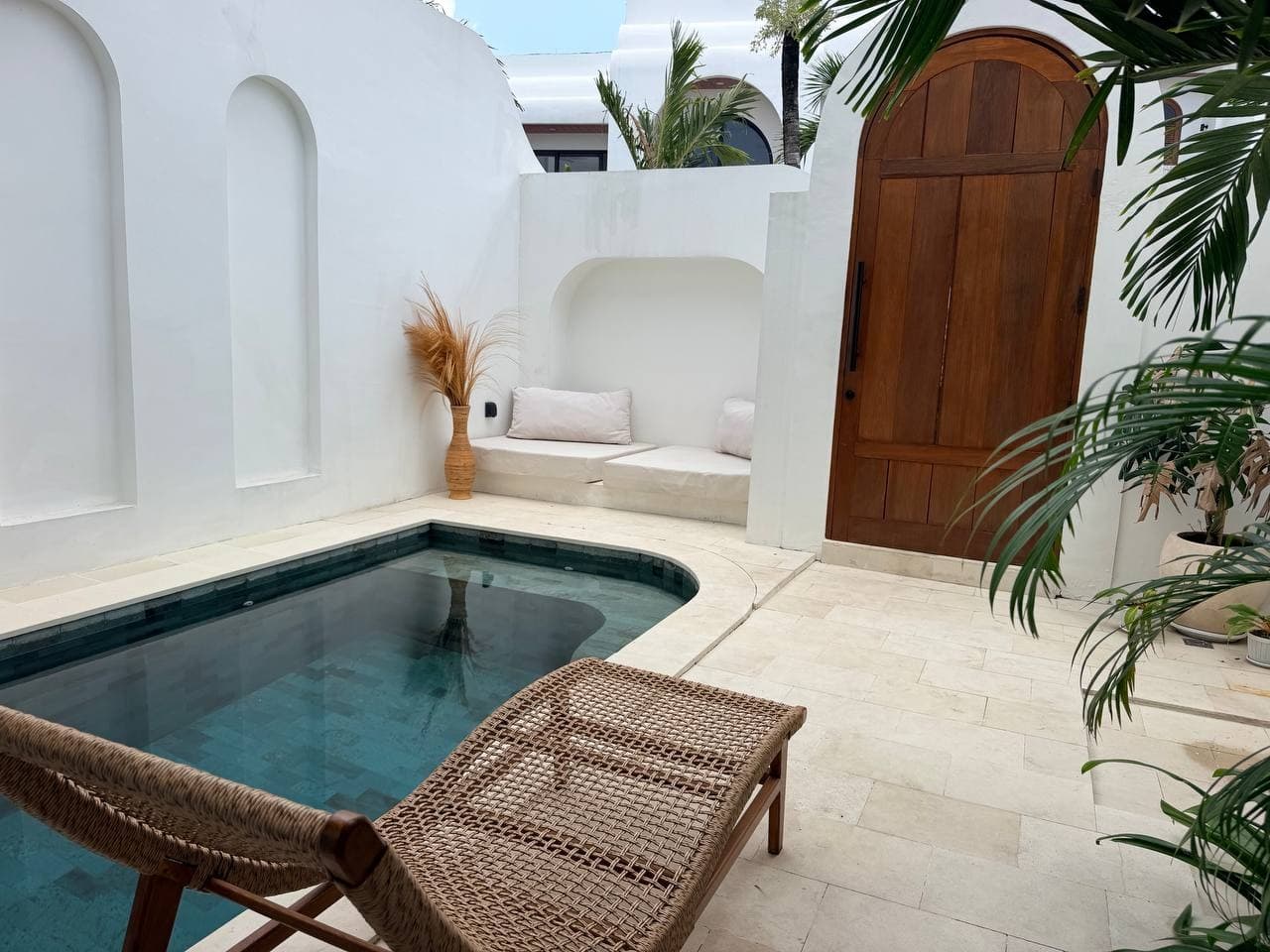 Pool and courtyard of an ATELIERO-managed villa